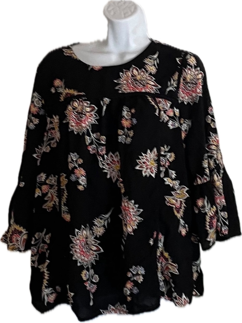 Black floral print blouse by Old Navy featuring three-quarter bell sleeves.